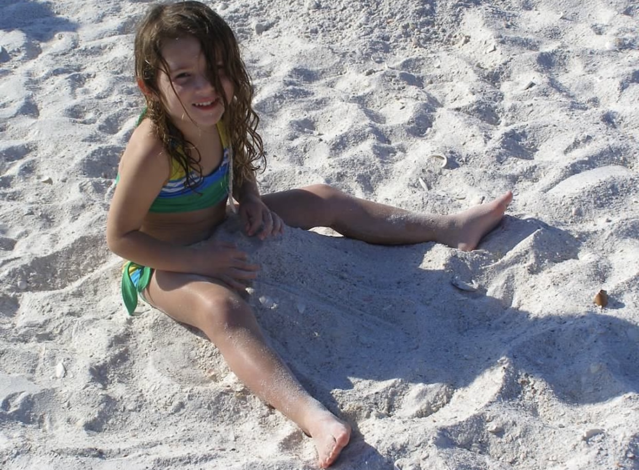 child me at the beach